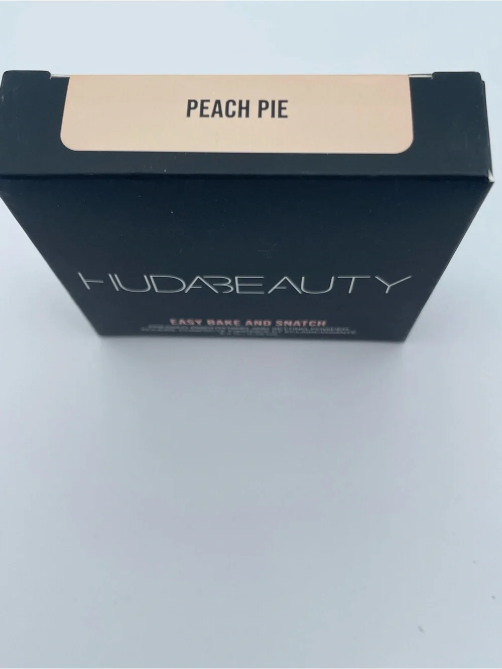 Huda Beauty Glowish Pressed Powder in Light & Easy Bake & Snatch Pressed Powder